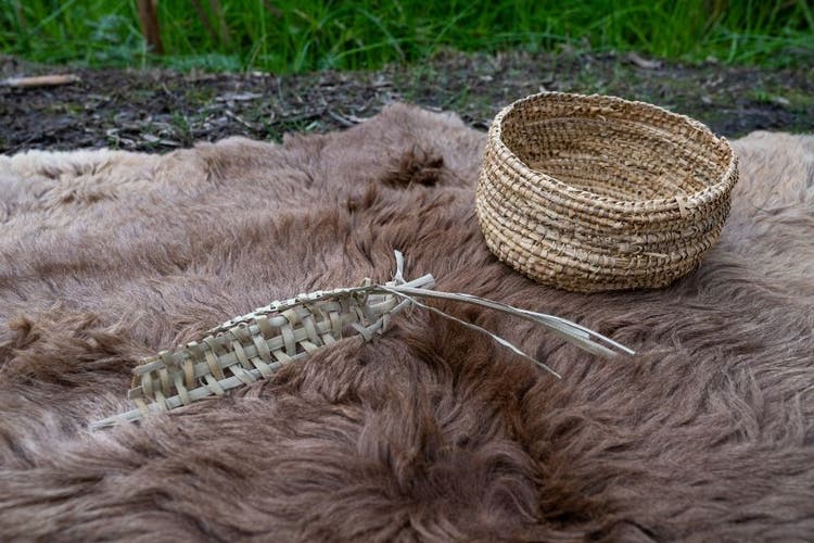 A basket on a kangaroo skin